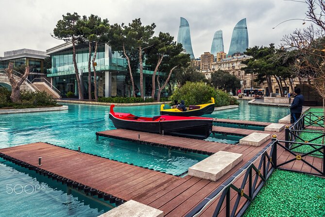 Baku City Sights Guided Night Walking Tour with Funicular - Returning through central Baku