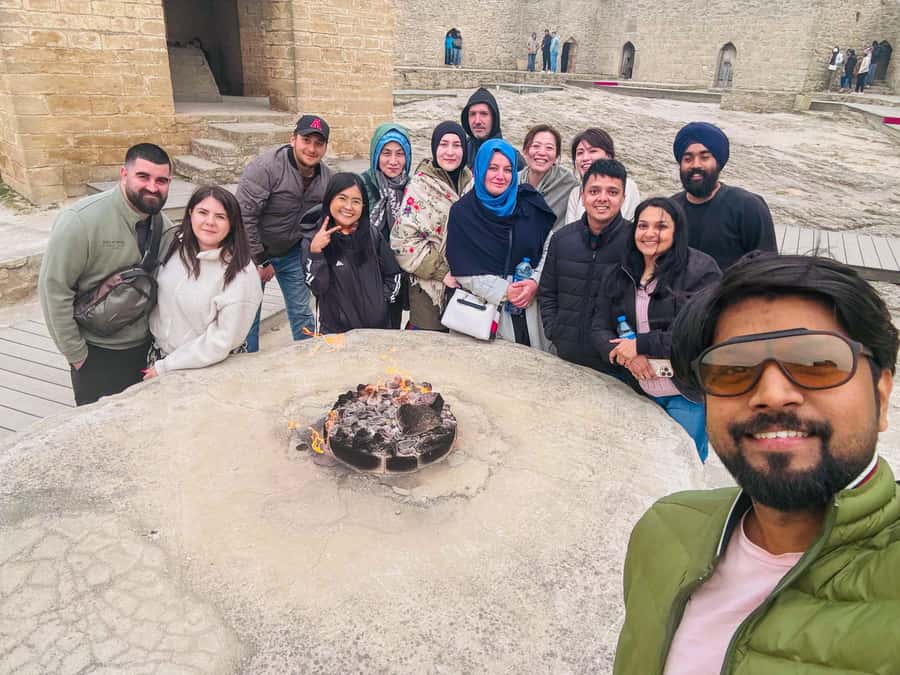 Baku: Gobustan, Mud Volcanoes, Fire Temple, & Yanar Dag Tour - Mud volcanoes and the required 25 AZN ride