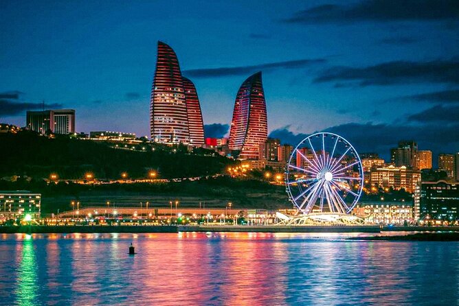 Baku Night City Tour Discover the Magic of Illuminated Landmarks - Heydar Mosque under evening lights