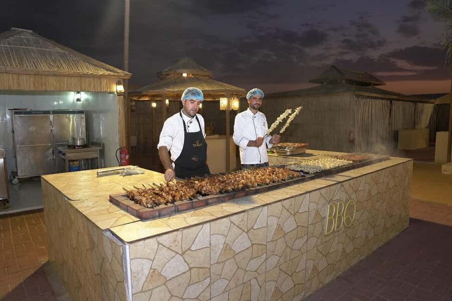 Dubai: Desert Safari, Camel Ride, Quad Bike & BBQ Dinner - Booking checks before you pay