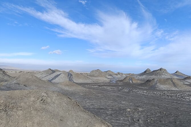 Gobustan Magic of Mud Volcanoes and Ancient Petroglyphs - Reading the petroglyphs at Boyuk-Dash