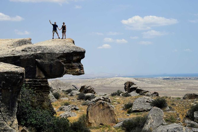 Gobustan National Park & Mud Volcanoes Tour - Reading the first human marks at Gobustan