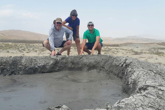 Small-Group Day Trip to Gobustan, Mud Volcanoes, Ateshgah & Yanar Dagh - What the guide and vehicle add to the price
